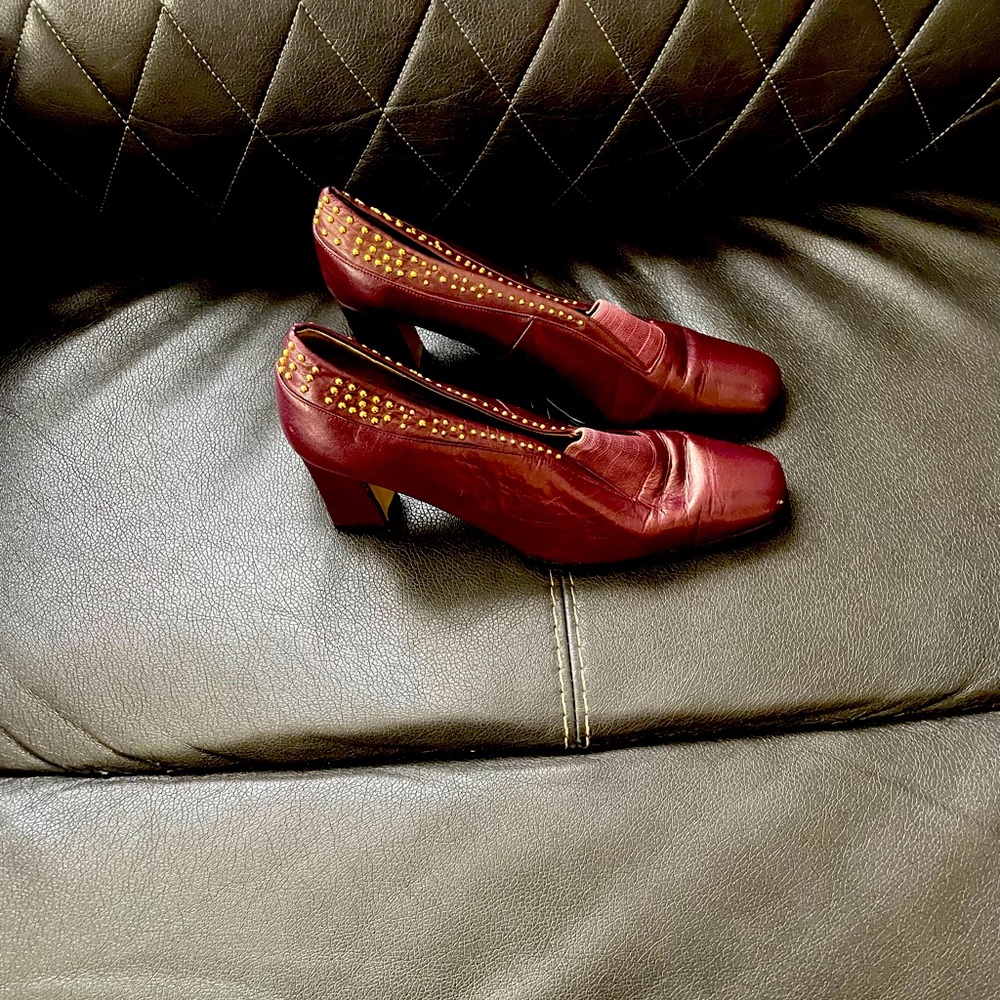 Gently used, studded, burgundy heels. Approximately 3 inches.